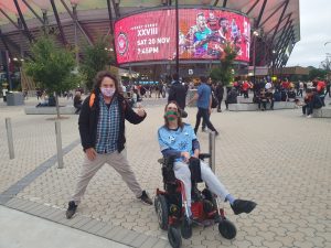 Jack at the Footy with his Support Worker James